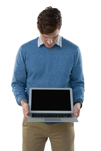 Male executive holding laptop — Stock Photo, Image