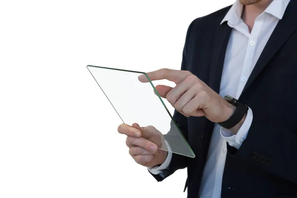 Empresário usando tablet digital de vidro — Fotografia de Stock