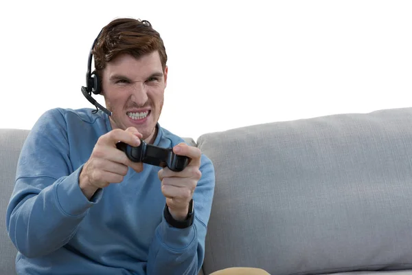 Мужчина играет в видеоигры — стоковое фото