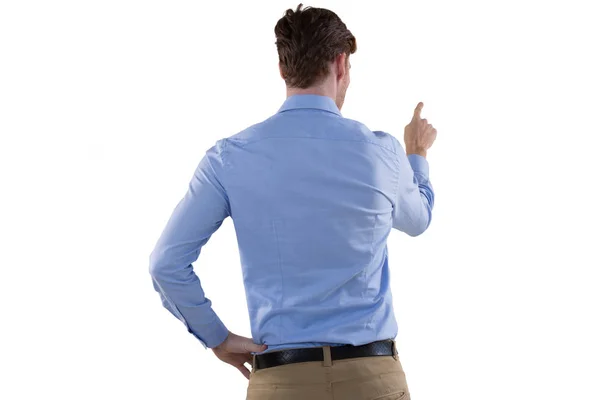 Male executive pretending to use an screen — Stock Photo, Image