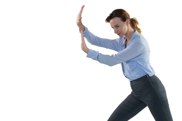 Mujer ejecutiva empujando el lado — Foto de Stock