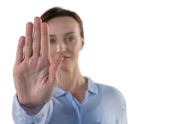 Esecutivo femminile facendo stop sign — Foto Stock