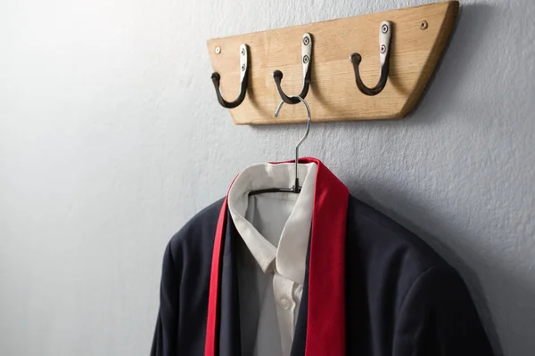 Blazer hanging on hook — Stock Photo, Image