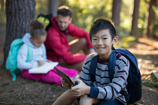 Happy boy using digital tablet — Stock Photo, Image