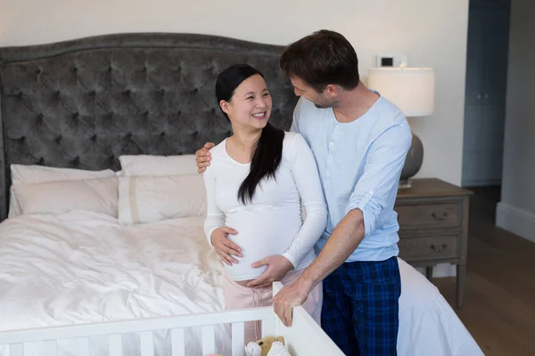 Couple feeling the presence of baby — Stock Photo, Image