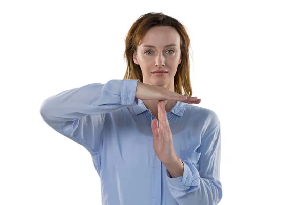 Female executive making time out sign — Stock Photo, Image