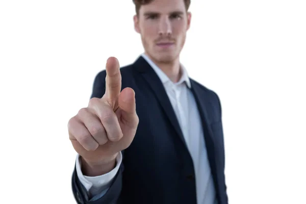 Businessman pretending to use an invisible screen — Stock Photo, Image