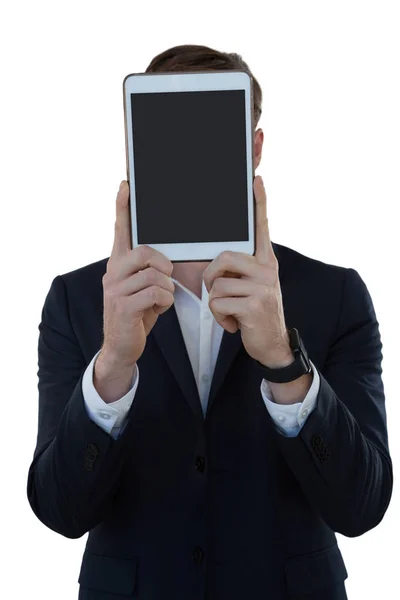 Zakenman verbergen van zijn gezicht met tablet — Stockfoto