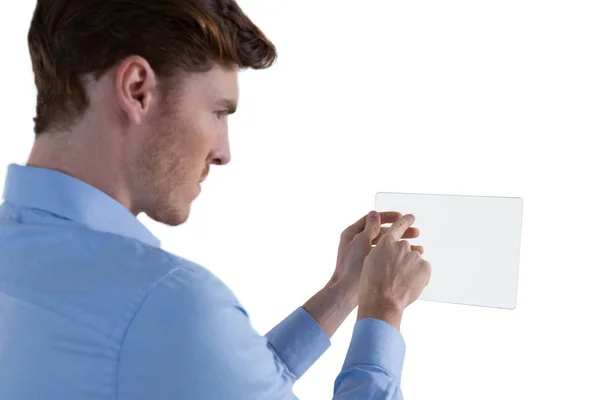 Male executive using glass tablet — Stock Photo, Image