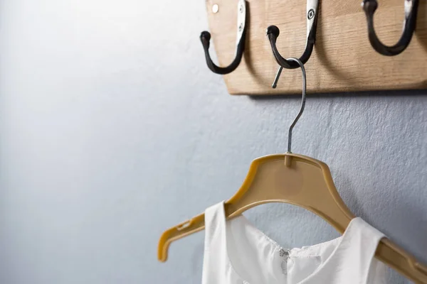 Dress hanging on hook — Stock Photo, Image