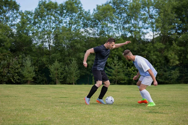 Játék futball-labdarúgók — Stock Fotó