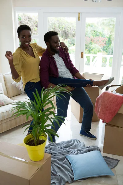 Couple enjoying in their new house — Stock Photo, Image