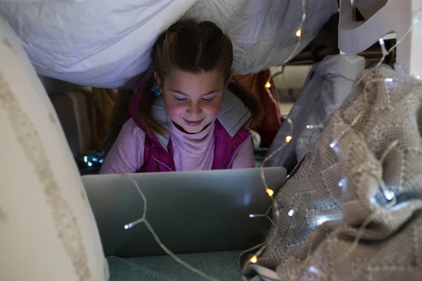 Cute girl using laptop — Stock Photo, Image