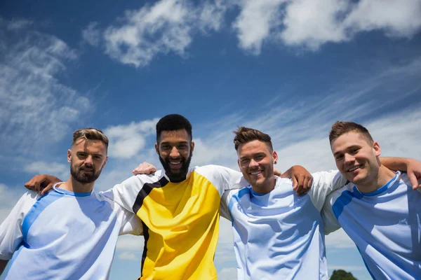 Football players together with arm around — Stock Photo, Image