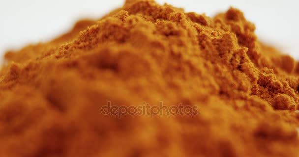 Cinnamon powder on white background — Stock Video