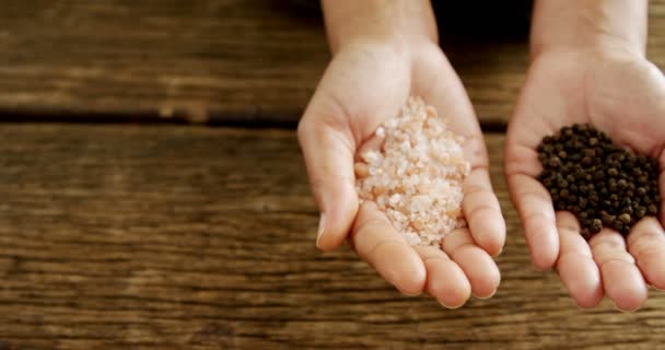 Hands holding sea salt — Stock Video