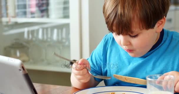 Boy Having Breakfast Dinning Table Home — Αρχείο Βίντεο