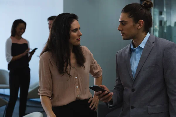 stock image Businessman discussing with his coworker