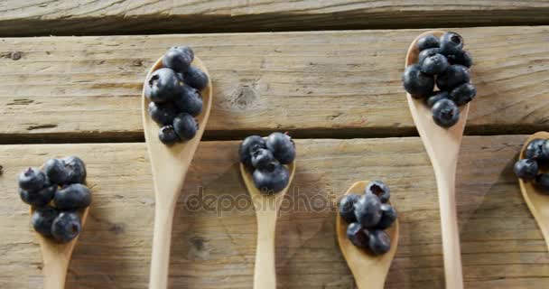 High Angle View Blueberries Spoon Arranged Wooden Table — Stock Video