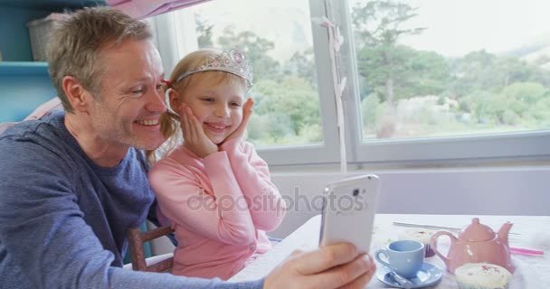 Father Daughter Taking Selfie Mobile Phone Home — Stock Video