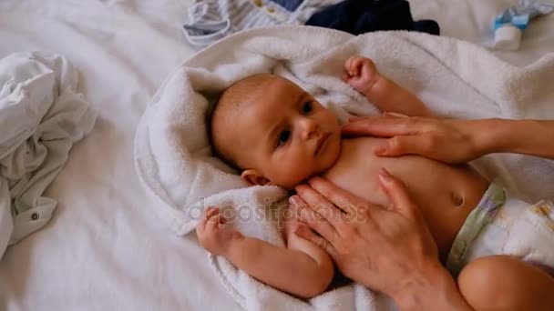 Cute Little Baby Receiving Massage Mother Bed Home — Stock Video