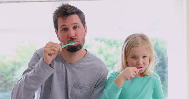 Smiling Father Daughter Brushing Teeth Bathroom — Stock Video