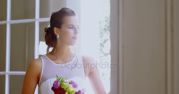 Smiling Bride Standing Window Bouquet — Stock Video