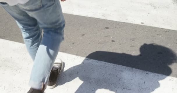 Young Man Walking Zebra Crossing Street — Stock Video