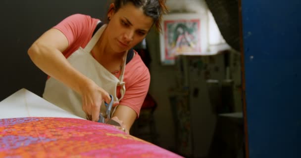 Woman Cutting Fabric Surfboard Workshop — Stock Video
