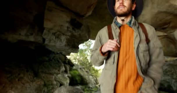 Male Hiker Standing Backpack Cave Countryside — Stock Video