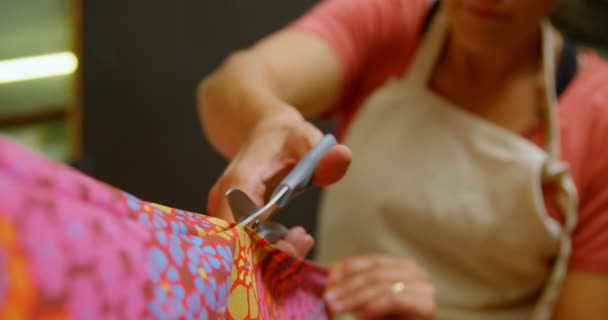 Woman Cutting Fabric Surfboard Workshop — Stock Video