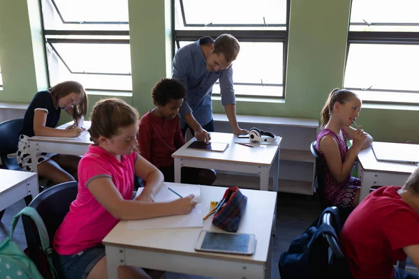 Side View Caucasian Male School Teacher Standing Desk African American — Stockfoto