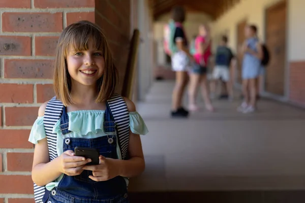 Front View Caucasian Schoolgirl Wearing Rucksack Leaning Wall Schoolyard Elementary — 스톡 사진