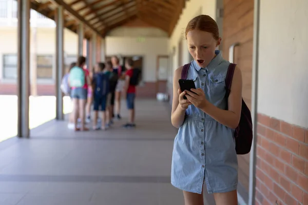 Front View Caucasian Schoolgirl Wearing Blue Dress Rucksack Standing Schoolyard — Stock Photo, Image