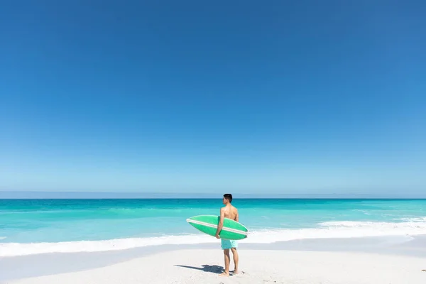 Rear View Distant Caucasian Man Standing Beach Blue Sky Sea — 스톡 사진