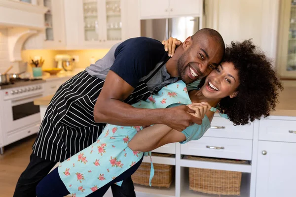 Side View Mixed Race Couple Home Wearing Aprons Dancing Kitchen — Stock Photo, Image