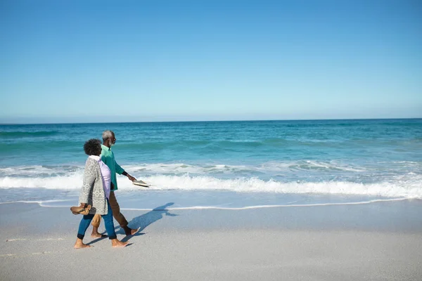 Side View Senior African American Couple Walking Beach Blue Sky — Stock Photo, Image