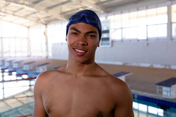 Portrait Happy Mixed Race Male Swimmer Swimming Pool Wearing Blue — Stok fotoğraf