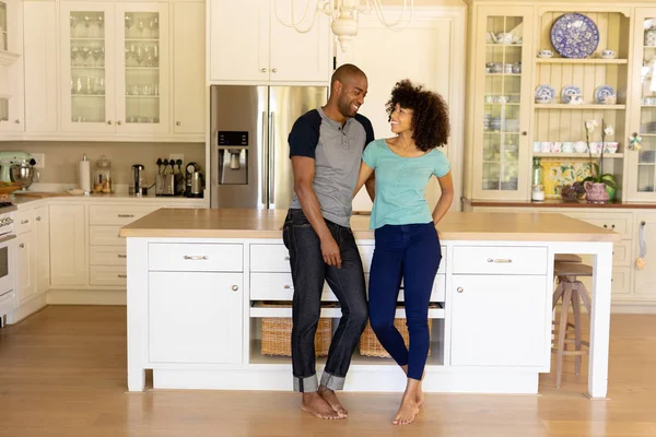 Front View Mixed Race Couple Home Standing Kitchen Embracing Looking — Stock Photo, Image