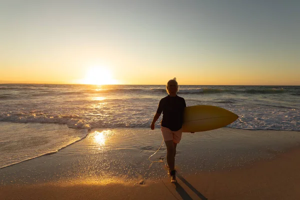 Front View Senior Caucasian Woman Beach Sunset Walking Sand Camera — 스톡 사진