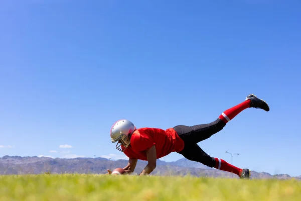 Low Angle Side View Mixed Race Male American Football Player — Stockfoto