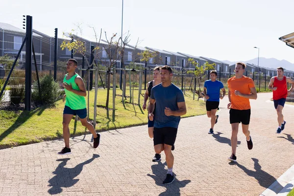 Front View Sporty Multi Ethnic Group Male Runners Training Park — ストック写真