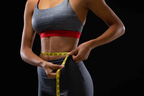 Visão Lateral Seção Média Uma Mulher Forma Vestindo Roupas Esportivas — Fotografia de Stock