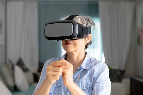 Senior Caucasian Woman Spending Time Home Using Headset Social Distancing — Stock Photo, Image