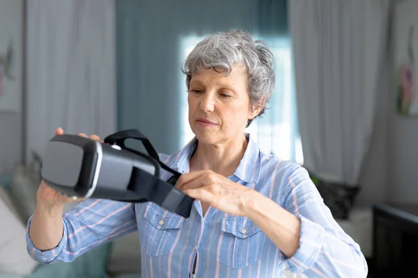 Senior Caucasian Woman Spending Time Home Putting Headset Social Distancing — Stock Photo, Image