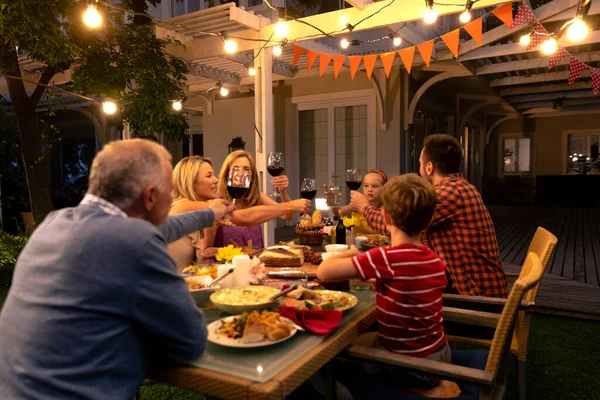 Side View Multi Generation Caucasian Family Sitting Dinner Table Celebration — Stock Photo, Image