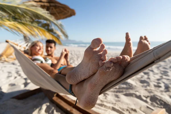 Caucasian Couple Enjoying Time Beach Lying Hammock Embracing Holding Hands — Stock Photo, Image