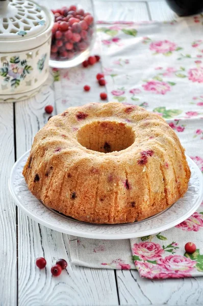 The dish is a cake with lemon and cranberries