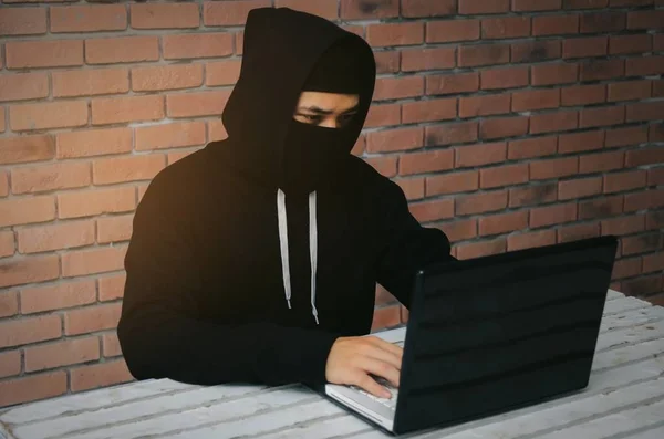 Young Asian Man Black Jacket Hood Stealing Information Laptop Computer — Stock Photo, Image