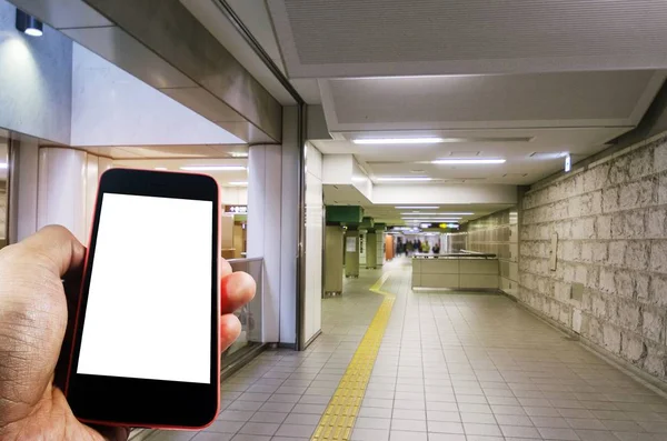 Hand Using Smart Phone Isolated Blank Screen Blurred Image Subway — Stock Photo, Image